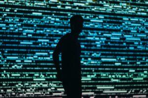 Pennsylvania Wiretap spy phone record data breach man in front of data