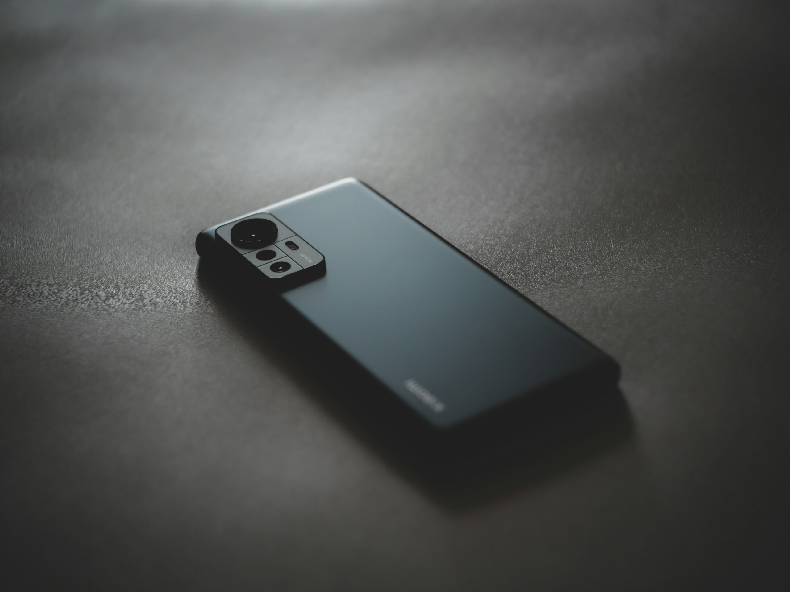phone on table in dim room quiet hours telemarketing TCPA