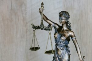 woman with the scales for law daniels law lawsuit