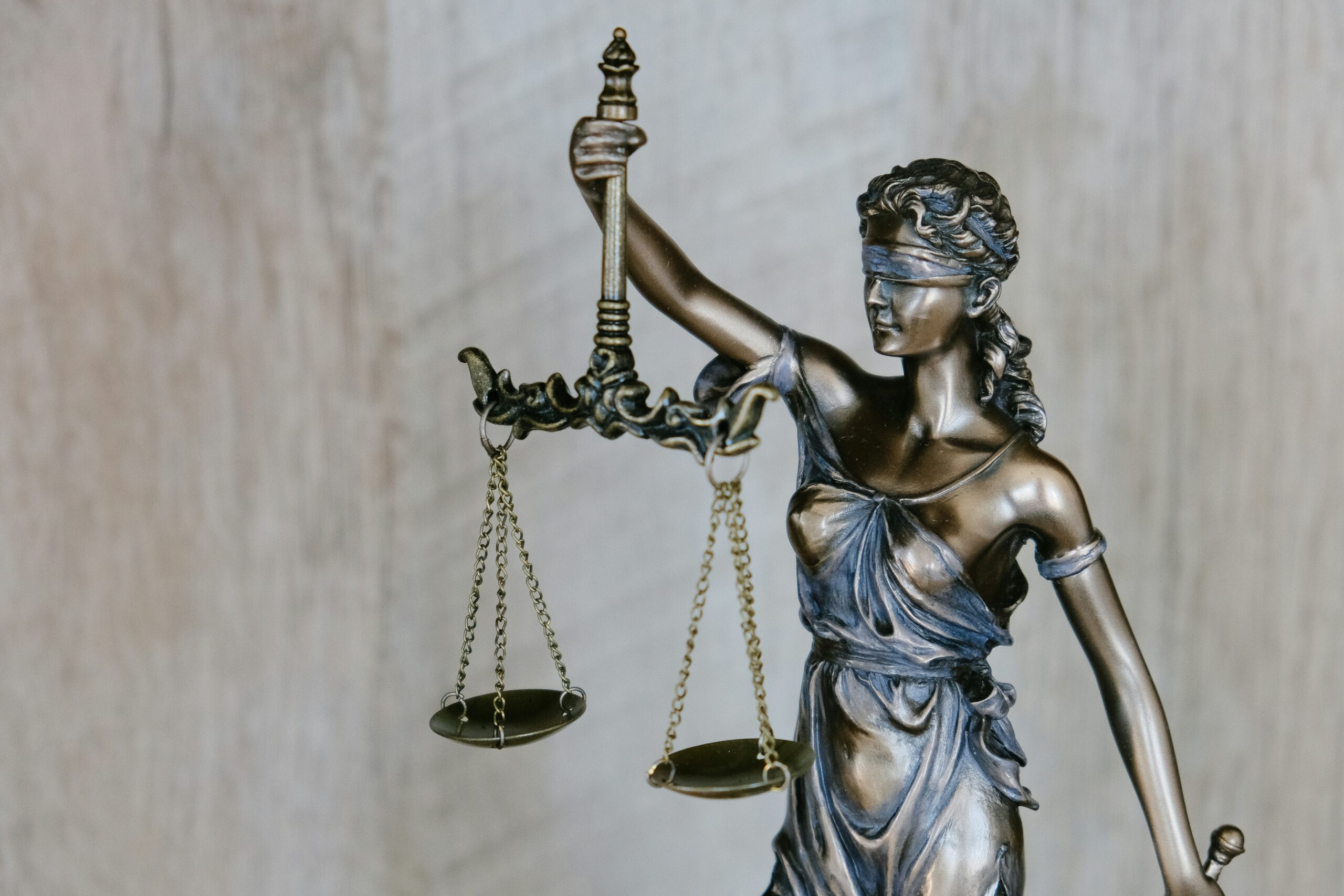 woman with the scales for law daniels law lawsuit