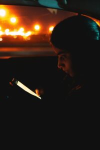 woman on cell phone at night hindi TCPA quiet hours