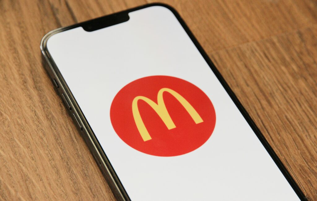 phone on table with mcdonalds app on it sweepstakes mcdonalds app