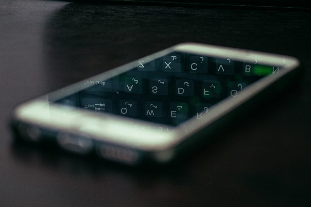 phone on table with reflection opt out tcpa telemarketing