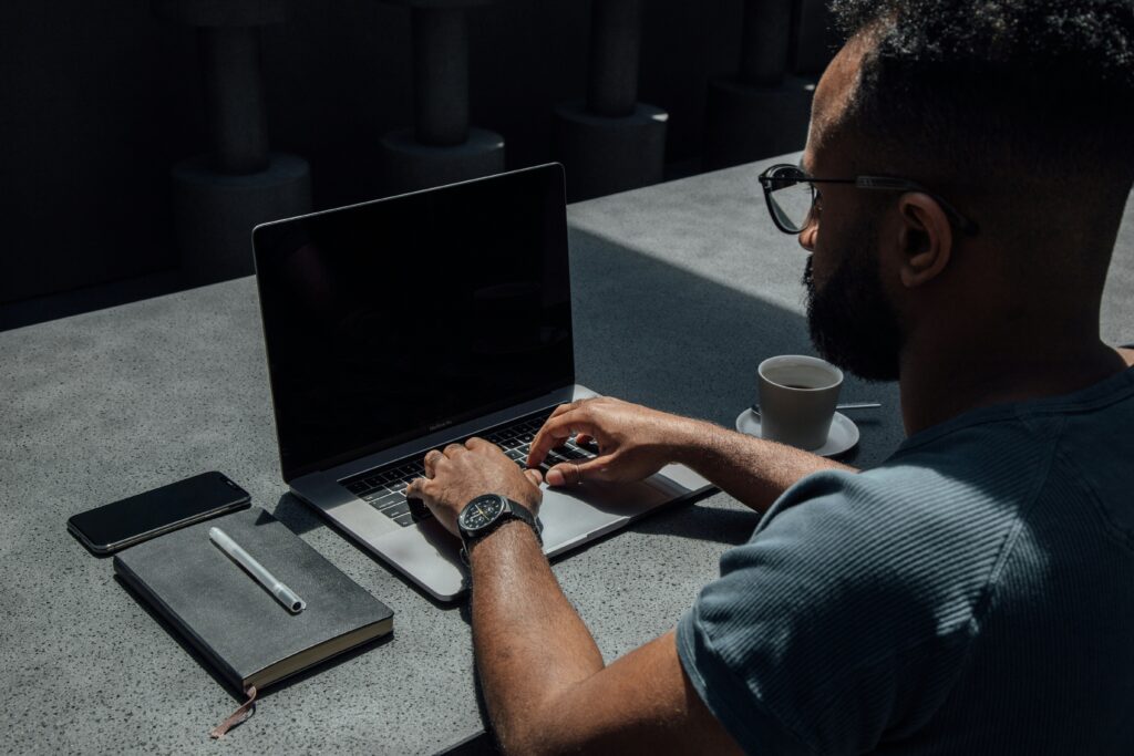 washington email laws guy looking at his computer screen possibly emailing