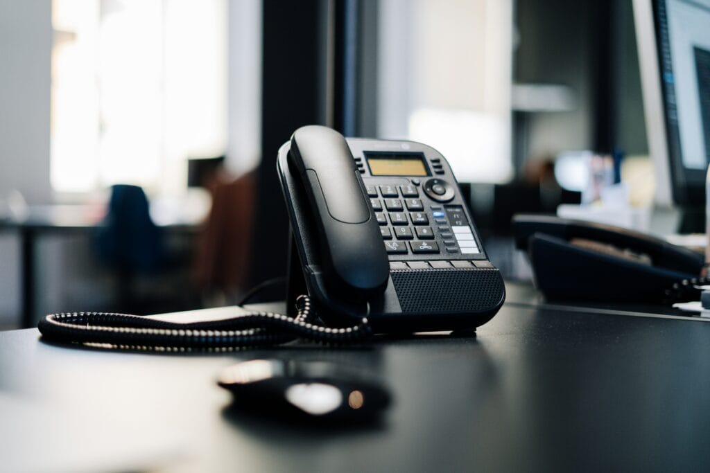 TCPA rules black telephone on desk telemarketing consumer