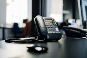 TCPA rules black telephone on desk telemarketing consumer