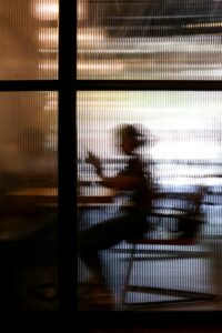 person on the phone through a window CIPA wiretap